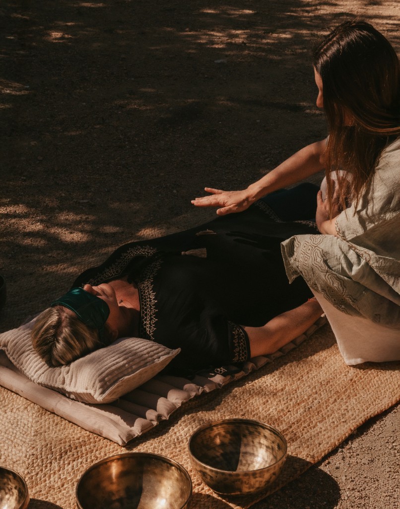 Breathwork support session outdoors with singing bowls