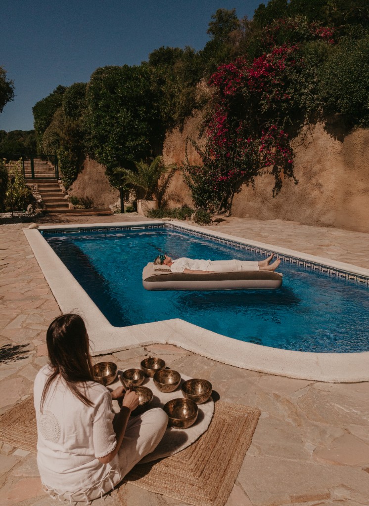 Floating sound bath setup in the retreat pool